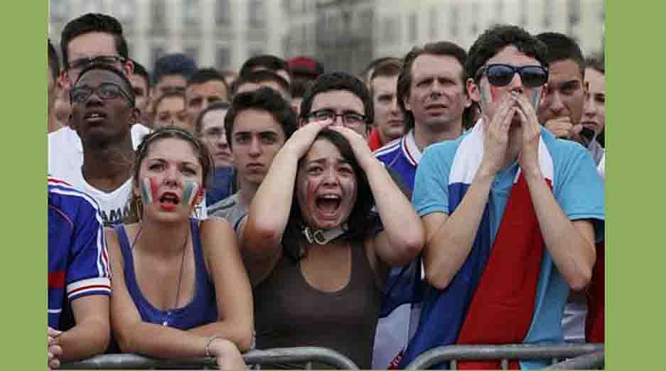 France fans react as they gather to watch the mach against Germany on a giant screen in central Lyon. Reuters