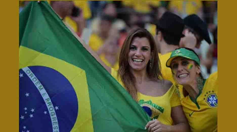 Brazilian fans cheer before a quarter-final football match between Brazil and Colombia at the Castelao Stadium in Fortaleza during the 2014 FIFA World Cup on July 4, 2014. AFP