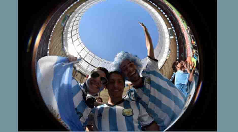 Fans of Argentina pose prior to a quarter-final football match between Argentina and Belgium at the Mane Garrincha National Stadium in Brasilia during the 2014 FIFA World Cup on July 5, 2014. AFP