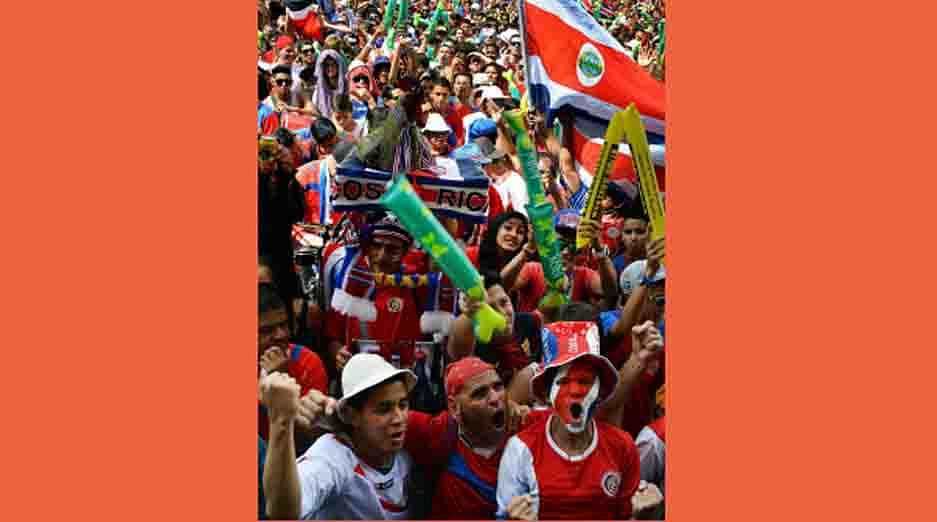Costa Rican fans react as they watch the Brazil 2014 FIFA World Cup football match against Netherlands on a giant screen at Democracy Square in San Jose on July 05, 2014. AFP