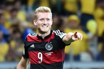 Germany's forward Andre Schuerrle celebrates after scoring during the semi-final football match between Brazil and Germany at The Mineirao Stadium in Belo Horizonte on July 8, 2014, during the 2014 FIFA World Cup. AFP