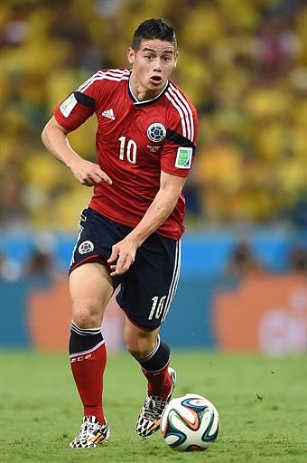 Colombia's midfielder James Rodriguez runs with the ball during the quarter-final football match between Brazil and Colombia at the Castelao Stadium in Fortaleza during the 2014 FIFA World Cup on July 4, 2014. AFP