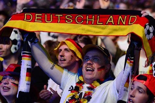 A Germany fan reacts during the FIFA World Cup 2014 semi final football match between Germany and Brazil during a public viewing at the Brandenburg Gate in Berlin on July 8, 2014. AFP