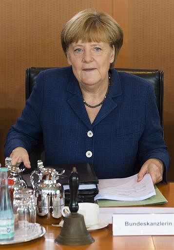 German Chancellor Angela Merkel attends a weekly meeting of the German cabinet at the chancellery in Berlin on July 9, 2014. AFP
