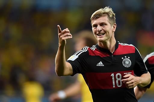 Germany's midfielder Toni Kroos celebrates after scoring during the semi-final football match between Brazil and Germany at The Mineirao Stadium in Belo Horizonte during the 2014 FIFA World Cup on July 8, 2014. AFP