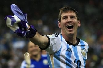 Argentina's forward and captain Lionel Messi celebrates his team's victory at the end of the semi-final football match between Netherlands and Argentina of the FIFA World Cup at The Corinthians Arena in Sao Paulo on July 9, 2014. Argentina won 4-2 on penalties. AFP