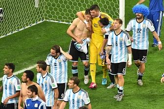 Argentina's players celebrate after the semi-final football match between Netherlands and Argentina of the FIFA World Cup at The Corinthians Arena in Sao Paulo on July 9, 2014. AFP