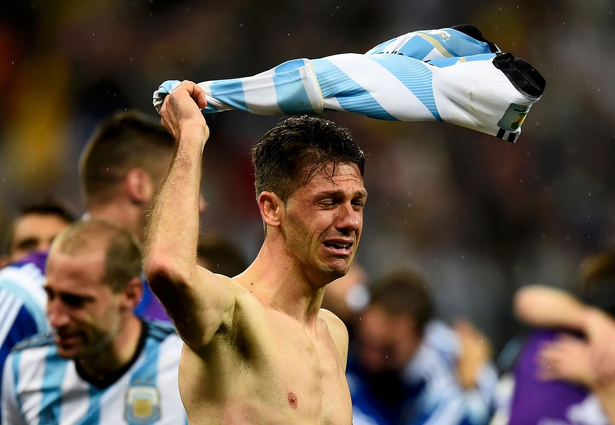 Argentina's Martin Demichelis cries after the team's 2014 World Cup semi-finals against Netherlands at the Corinthians arena in Sao Paulo on July 9, 2014. Reuters