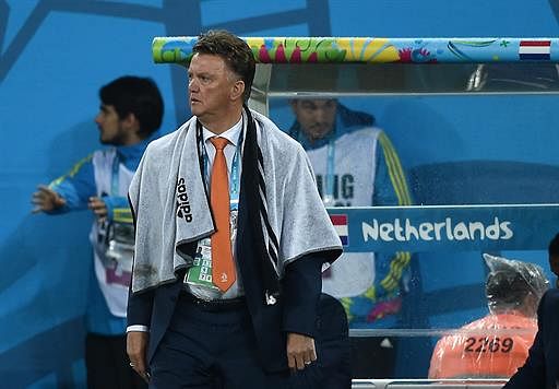 Netherlands' coach Louis van Gaal looks on during the semi-final football match between Netherlands and Argentina of the FIFA World Cup at The Corinthians Arena in Sao Paulo on July 9, 2014. AFP