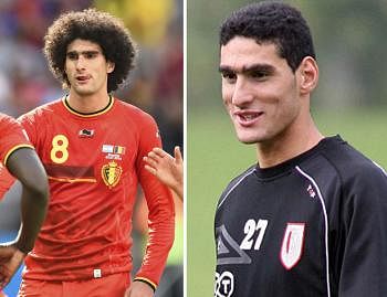 Belgium's midfielder Marouane Fellaini is before hair cut (L) and after hair cut (R)