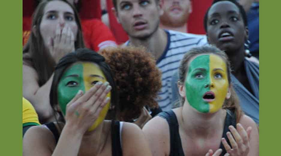Fans of Brazil watch the FIFA World Cup third-place match between Brazil and the Netherlands on a screen during the Fan Fest at Copacabana beach in Rio de Janeiro, Brazil, on July 12, 2014. Germany and Argentina will play the final on Sunday. AFP