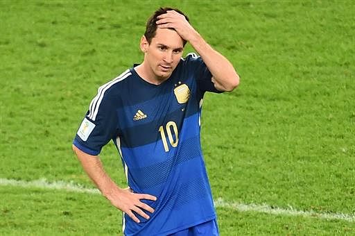 Argentina's forward and captain Lionel Messi reacts after defeat in extra-time in the final football match between Germany and Argentina for the FIFA World Cup at The Maracana Stadium in Rio de Janeiro on July 13, 2014. AFP