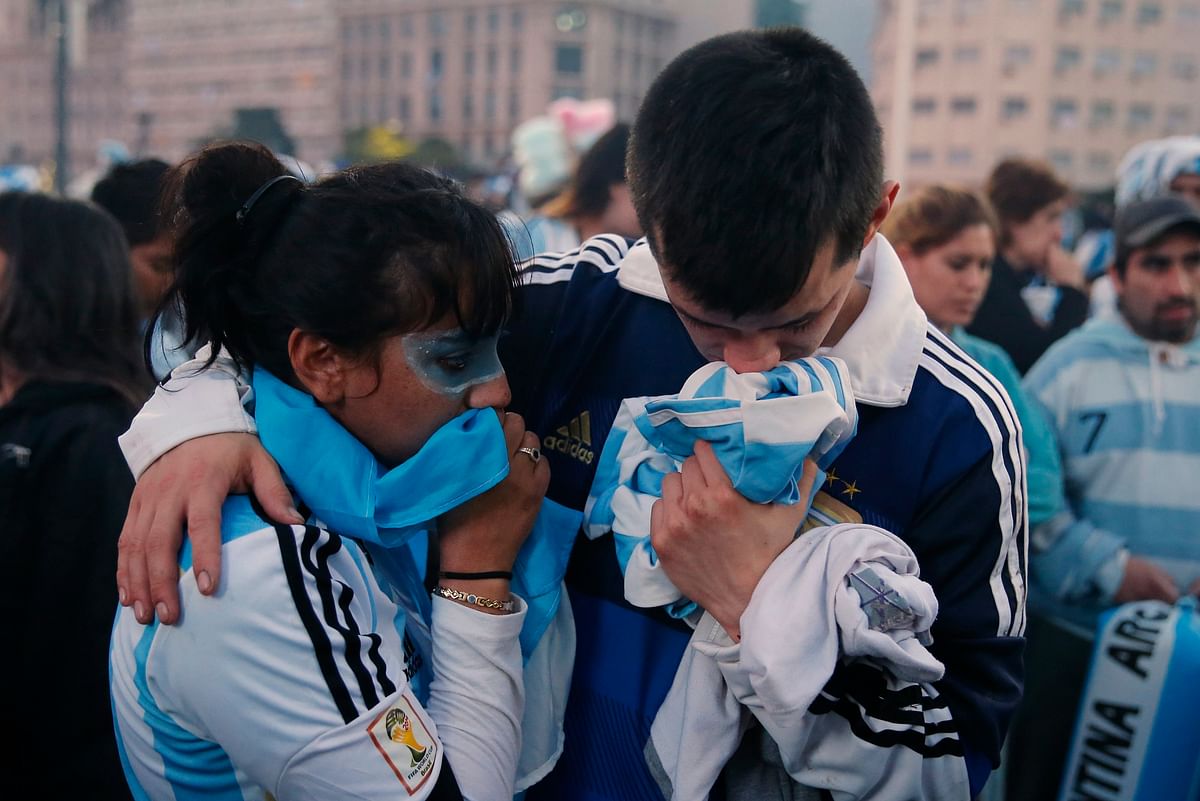Argentina's fans react after Argentina lost to Germany in their 2014 World Cup final soccer match in Brazil, at a public square viewing area in Buenos Aires on July 13 2014. Reuters