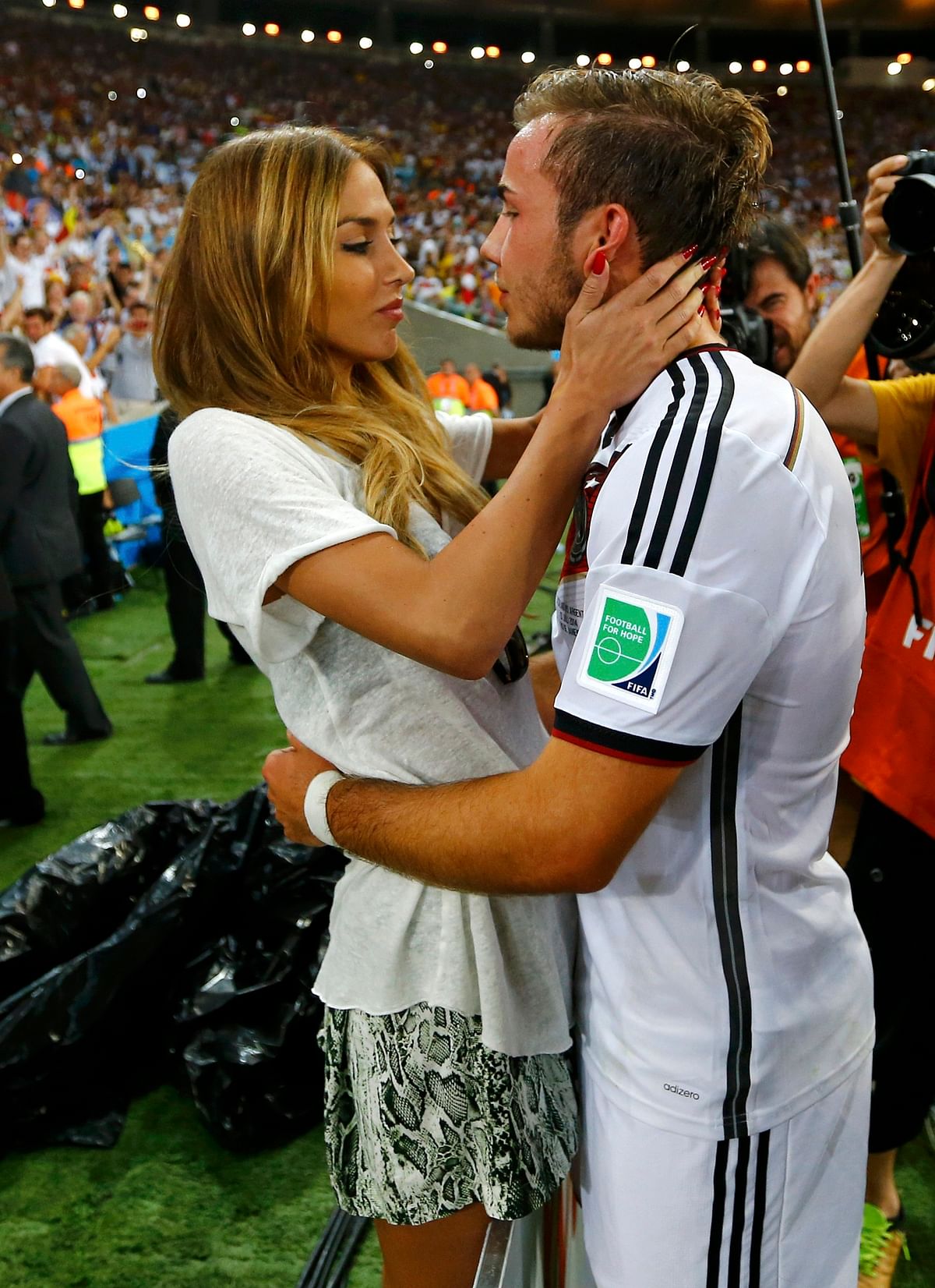 Germany's Mario Goetze hugs his girlfriend Ann-Kathrin Brommel after extra time in the 2014 World Cup final between Germany and Argentina at the Maracana stadium in Rio de Janeiro on July 13, 2014. Reuters