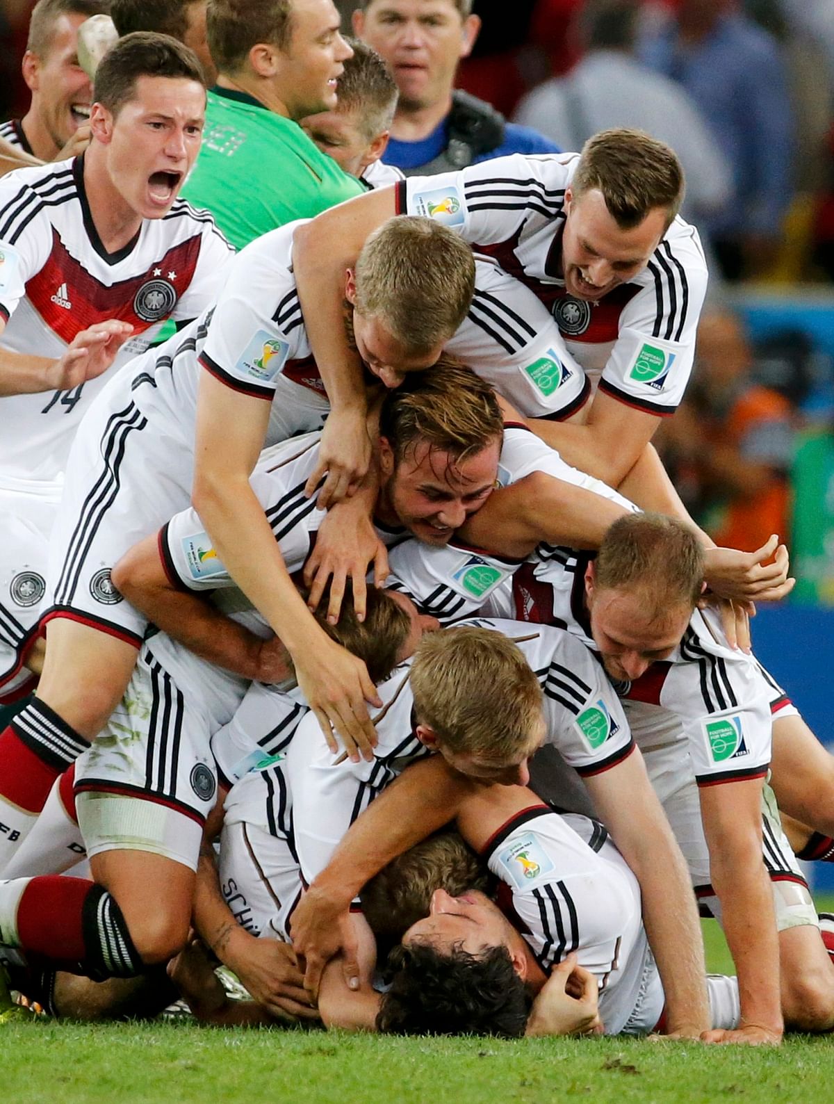 Germany's team celebrates after winning their 2014 World Cup final against Argentina at the Maracana stadium in Rio de Janeiro on July 13, 2014. Reuters