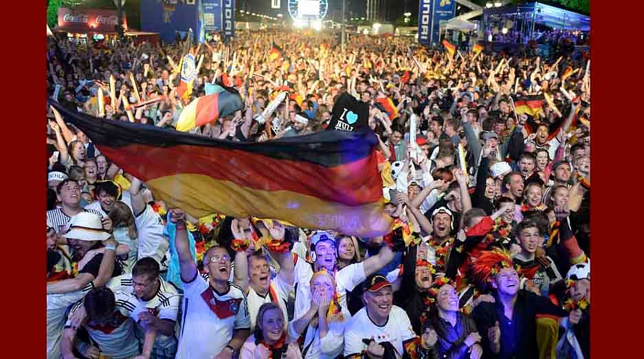 Fans of Germany celebrate as they watch the 2014 World Cup final between Germany and Argentina in Brazil at a public screening of the match in Berlin on July 13, 2014. Reuters
