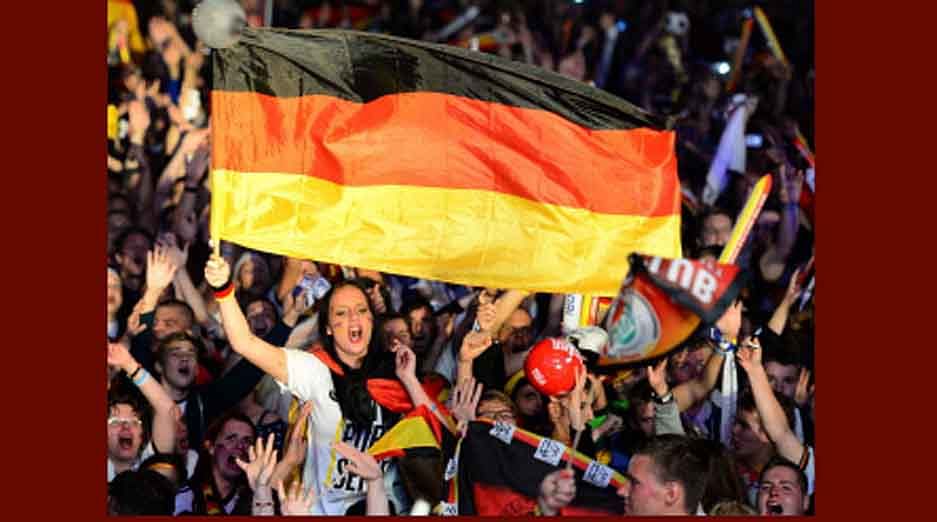 German fans react as Germany won the FIFA World Cup 2014 final football match Germany vs Argentina played in Brazil during an outdoor screening near the Brandenburg Gate in Berlin, on July 13, 2014. AFP