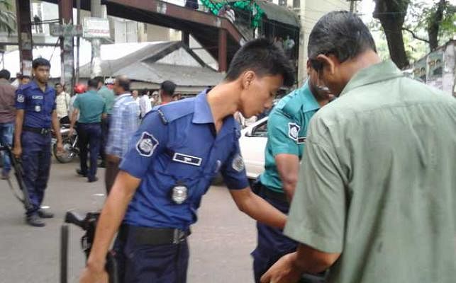 Strict checking were going on in Chittagong Court premises after an anonymous phone call threatened to bomb out the court building. Photo: Prothom Alo