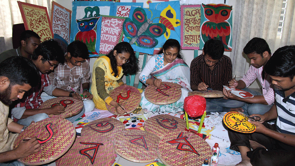 Bogra Bundhu Sabha members doing last minute preparations to celebrate the Bengali new year Pahela Baishakh in Sherpur road in the city. Photo: Zahid