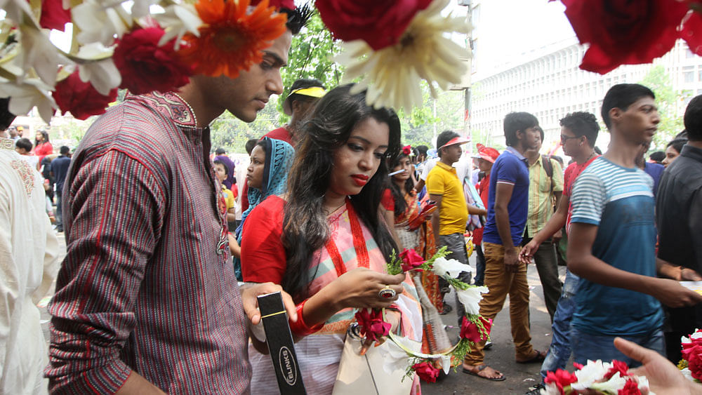 People buying flowers from city