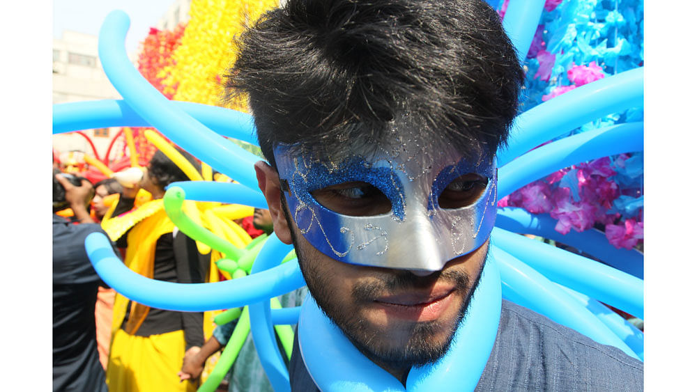 People wearing colourful mask in the rally. Photo: Zahidul Karim