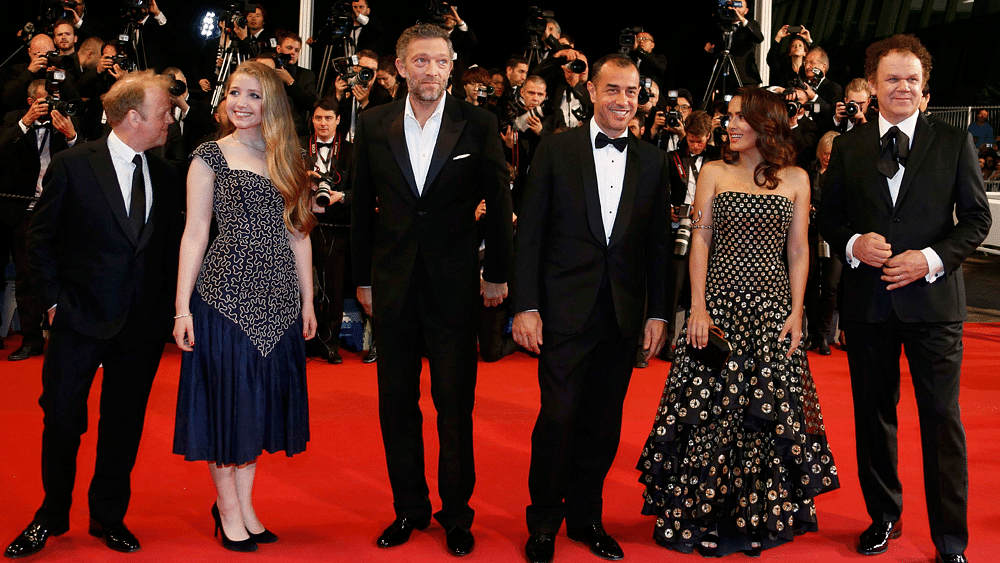 Cast members John C. Reilly, Salma Hayek, director Matteo Garrone, cast members Vincent Cassel, Bebe Cave and Toby Jones pose on the red carpet as they arrive for the screening of the film "Tale of Tales" .Photo: Reuters