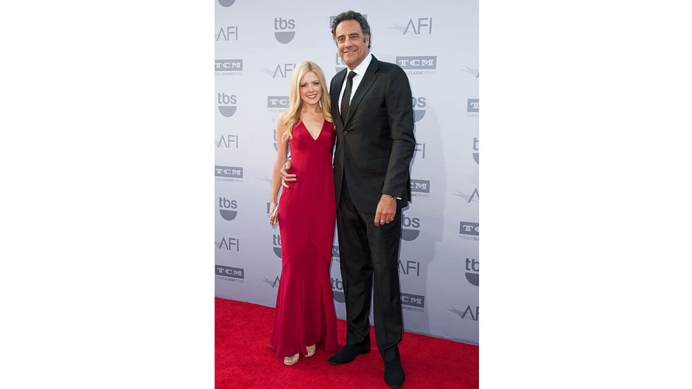 Nancy Cardigan and actor/comedian Brad Garrett arrive at the AFI Life Achievement Award Gala Honoring Steve Martin in Hollywood, California, on June 4, 2015. Photo: AFP