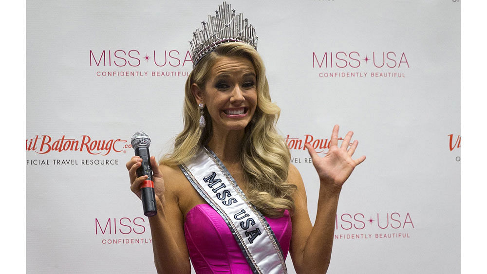 Newly crowned Miss USA Olivia Jordan celebrates backstage following the 2015 Miss USA beauty pageant in Baton Rouge, Louisiana July 12, 2015. Photo: Reuters