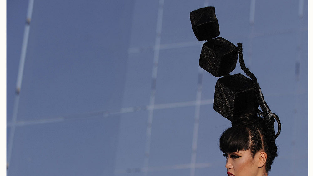 Vietnamese catwalk producer and model Jessica Minh Anh presents a creation during the Jessica Minh Anh’s Summer Fashion Show 2015. Photo: AFP