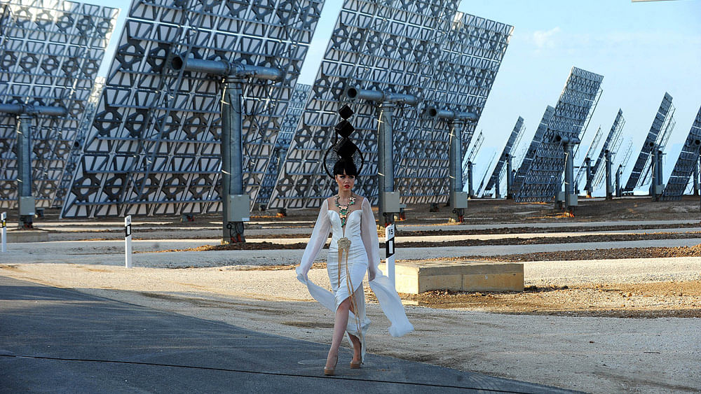 Vietnamese catwalk producer and model Jessica Minh Anh presents a creation during the Jessica Minh Anh’s Summer Fashion Show 2015. Photo: AFP