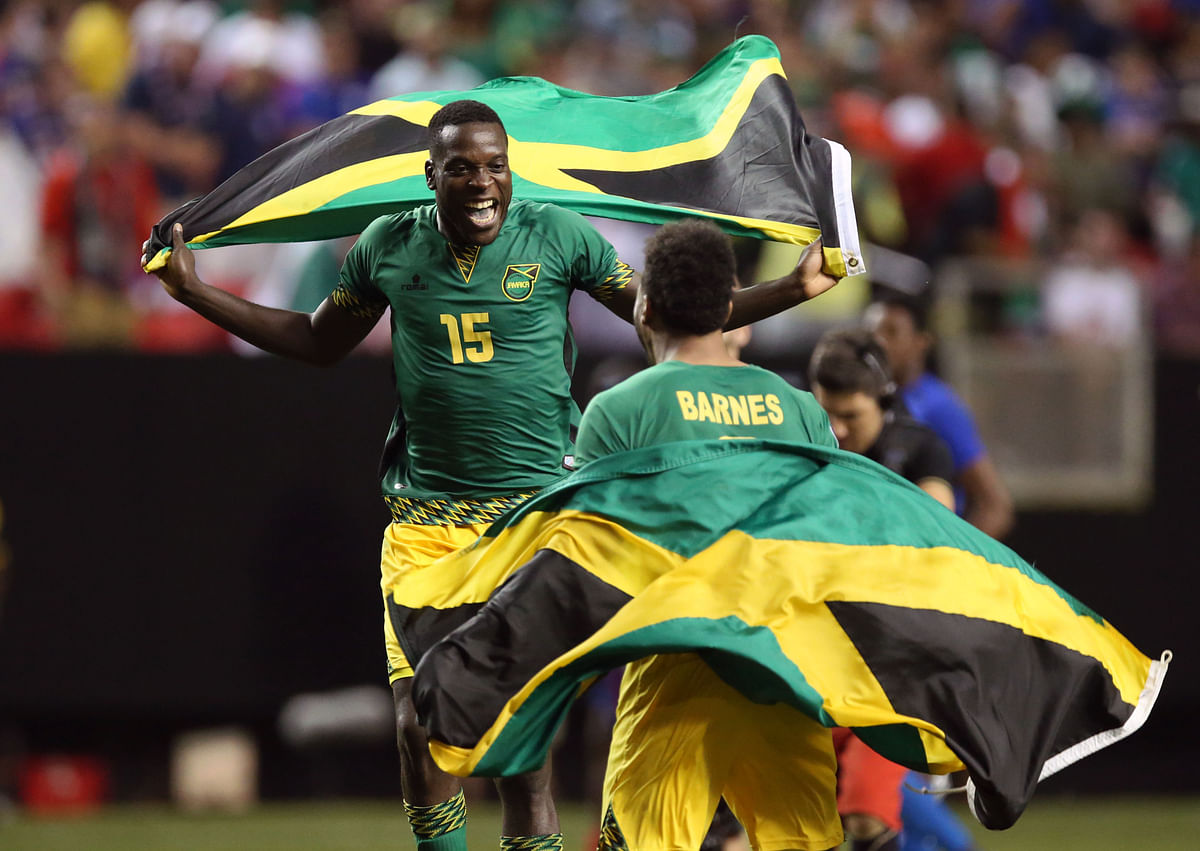 Jamaica midfielder Je-Vaughn Watson (15) and Giles Barnes (9) celebrate after defeating the United States 2-1 in the CONCACAF Gold Cup semifinal match at Georgia Dome.Photo: Reuters