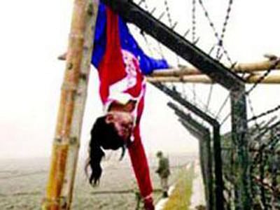 Hanging body of Felani on the border fence