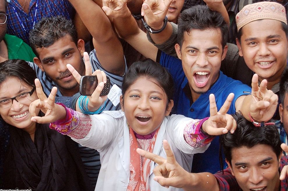 Students celebrate the moment after the government withdraws VAT on tuition fees of the government.  Photo: Focus Bangla