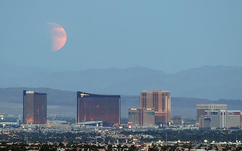 An eclipsed supermoon rises behind the Las Vegas Strip on September 27, 2015 in Las Vegas, Nevada. Photo: AFP