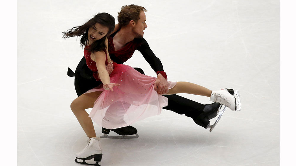Madison Chock and Evan Bates of the U.S. compete during the ice dance free dance program during China ISU Grand Prix of Figure Skating in Beijing, China, November 7, 2015. Photo: Reuters