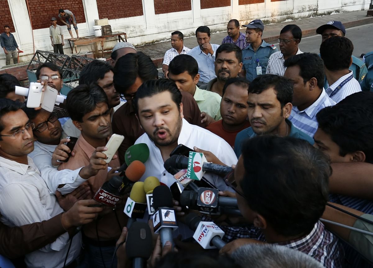 Hummam Quader Chowdhury, son of death row convict BNP leader Salauddin Quader Chowdhury, is speaking to newsmen in front of Bangabhaban on Saturday afternoon when he went there to submit a petition seeking retrial of his father. Photo: Hason Raza