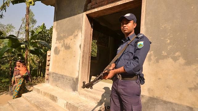 Policeman guards in front of Shia Mosque in Shibganj upazila of Bogra. Photo: Soyel Rana