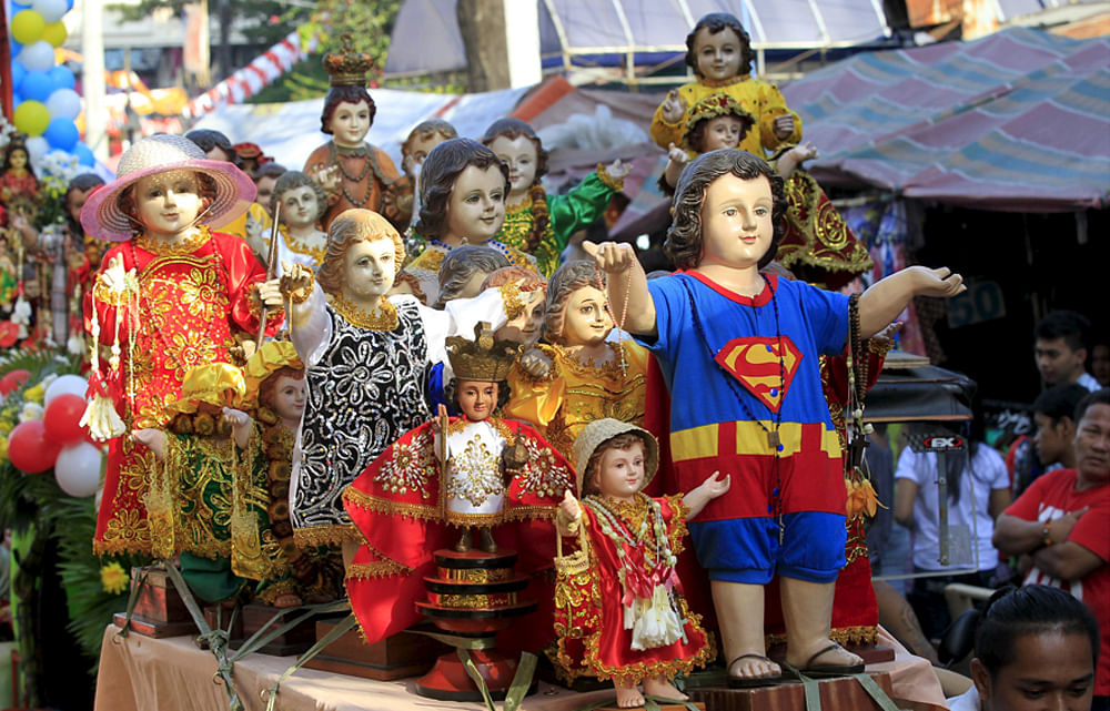 Varying Sto. Nino (infant Jesus) replicas are seen during a procession in Manila January 16, 2016, a day before the annual of the feast day of Sto. Nino on Sunday. Reuters