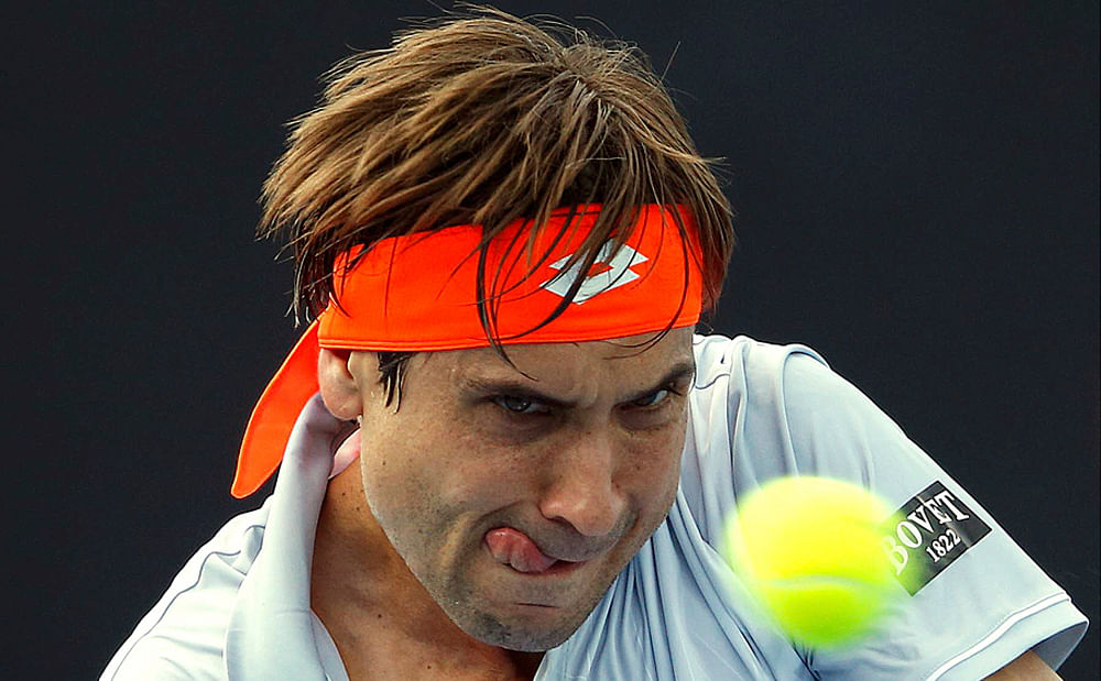 Spain`s David Ferrer hits a shot during his first round match against Germany`s Peter Gojowczyk at the Australian Open tennis tournament at Melbourne Park, Australia, January 19, 2016. Photo: Reuters
