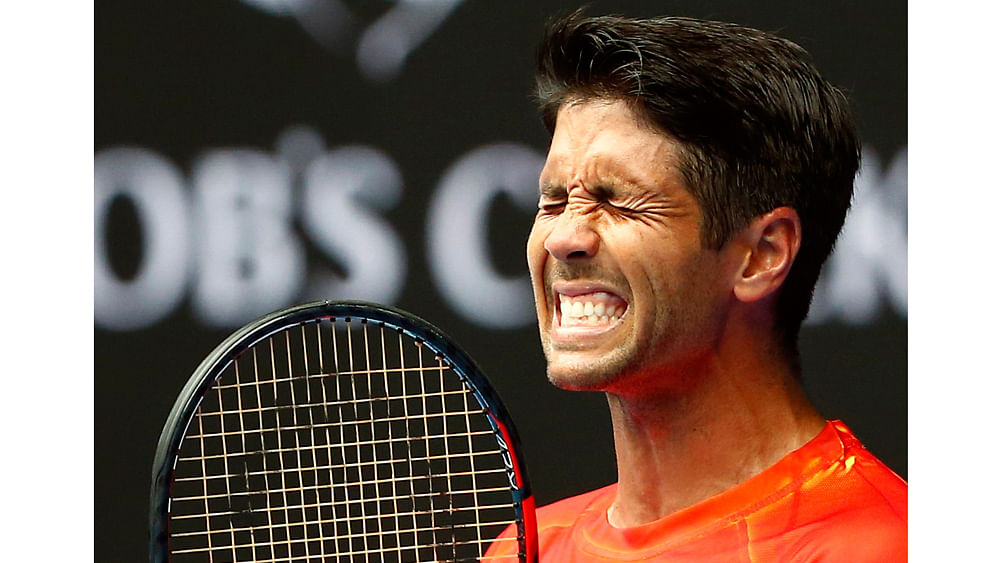 Spain`s Fernando Verdasco reacts after missing a shot during his first round match against Spain`s Rafael Nadal at the Australian Open tennis tournament at Melbourne Park, Australia, January 19, 2016. Photo: Reuters