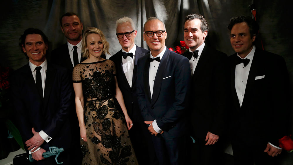 Actors Billy Crudup, Liev Schreiber, Rachel McAdams, John Slattery, Michael Keaton, Brian d`Arcy James and Mark Ruffalo (L to R) pose backstage with their award for Outstanding Performance in a Motion Picture for the film `Spotlight` at the 22nd Screen Actors Guild Awards in Los Angeles, California January 30, 2016. Photo: Reuters