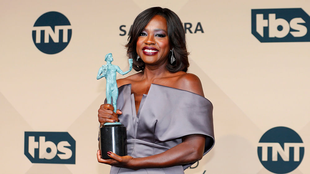 Viola Davis holds the award for Outstanding Performance by a Female Actor in a Drama Series for her role in `How to Get Away With Murder` during the 22nd Screen Actors Guild Awards in Los Angeles, California January 30, 2016. Photo: Reuters
