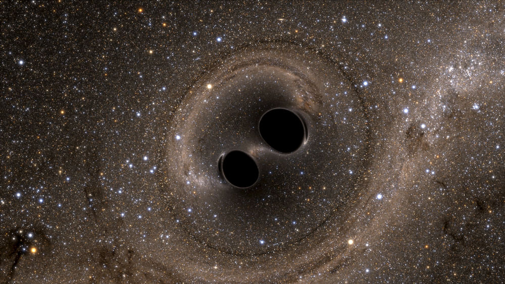 The collision of two black holes holes - a tremendously powerful event detected for the first time ever by the Laser Interferometer Gravitational-Wave Observatory, or LIGO - is seen in this still image from a computer simulation released in Washington February 11, 2016. Photo: Reuters