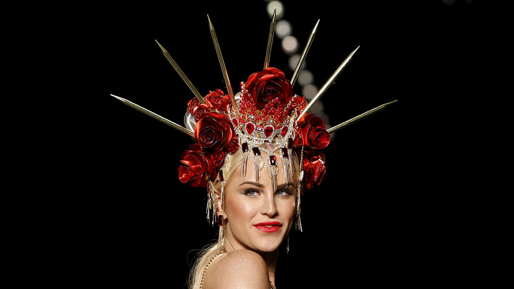 Gigi Gorgeous presents a creation during the American Heart Association`s (AHA) Go Red For Women Red Dress Collection, presented by Macy`s at New York Fashion Week February 11, 2016. Photo: Reuters