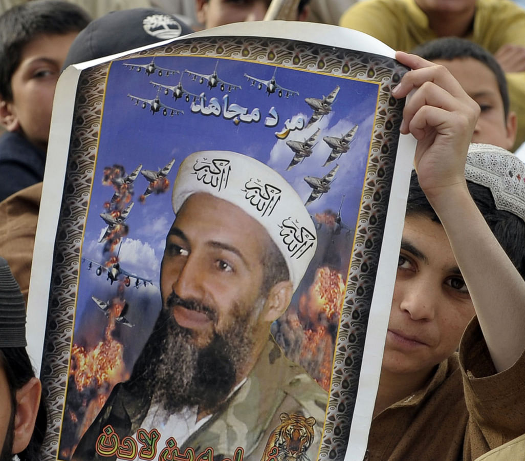 Supporters carrying a portrait of the slain Al-Qaeda leader Osama bin Laden. AFP file photo