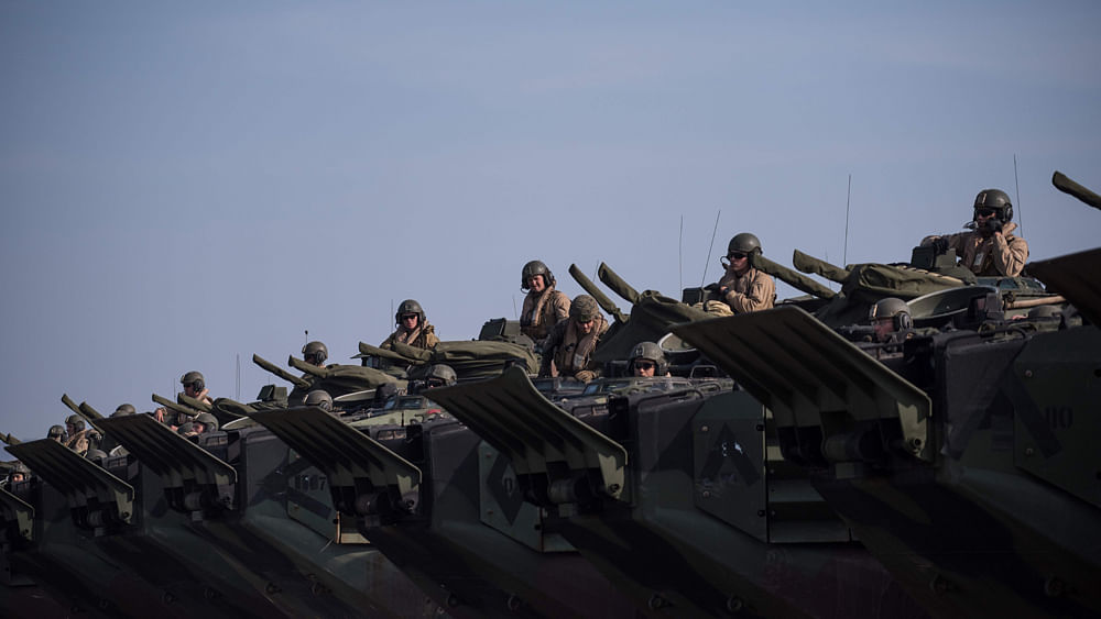 US assault Amphibious Vehicles (AAV) of the 31st Marine Expeditionary Unit prepare to return to a waiting ship during manoeuvres forming part of a joint military exercise with South Korea entitled `Ssang Yong`, near the southeastern port city of Pohang. Photo: AFP