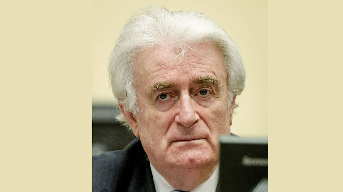 Bosnian Serb wartime leader Radovan Karadzic sits in the courtroom for the reading of his verdict at the International Criminal Tribunal for Former Yugoslavia (ICTY) in The Hague, on 24 March. Photo: AFP
