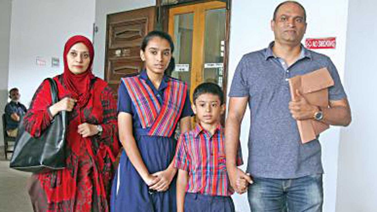 Minhaz Ahmed and his wife with their two children Maliha Muskan Ahmed and Maneu Ahmed at the High Court on Monday. Photo: Prothom Alo