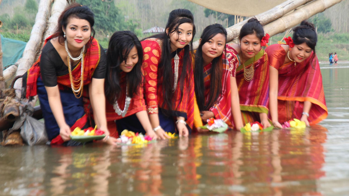 Revellers celebrate ‘Baisabi’ festival, marking the inauguration of Chakma ‘Phool Bijhu’, Tripura ‘Boisu’ and the Marma community’s ‘Sangrai’ festivals, that begins on Tuesday in the Chittagong Hill Tracts. Photo: Prothom Alo