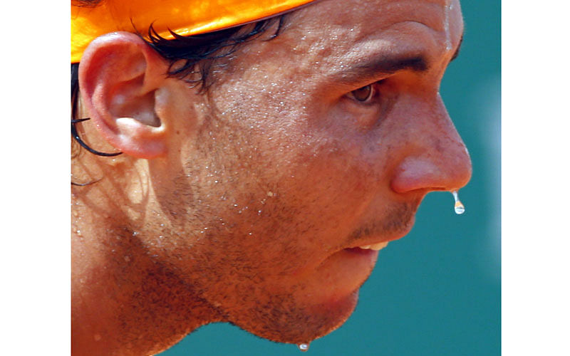 A drop of sweat drips from the face of Rafael Nadal of Spain during his final tennis match against Gael Monfils of France at the Monte Carlo Masters. Photo: Reuters